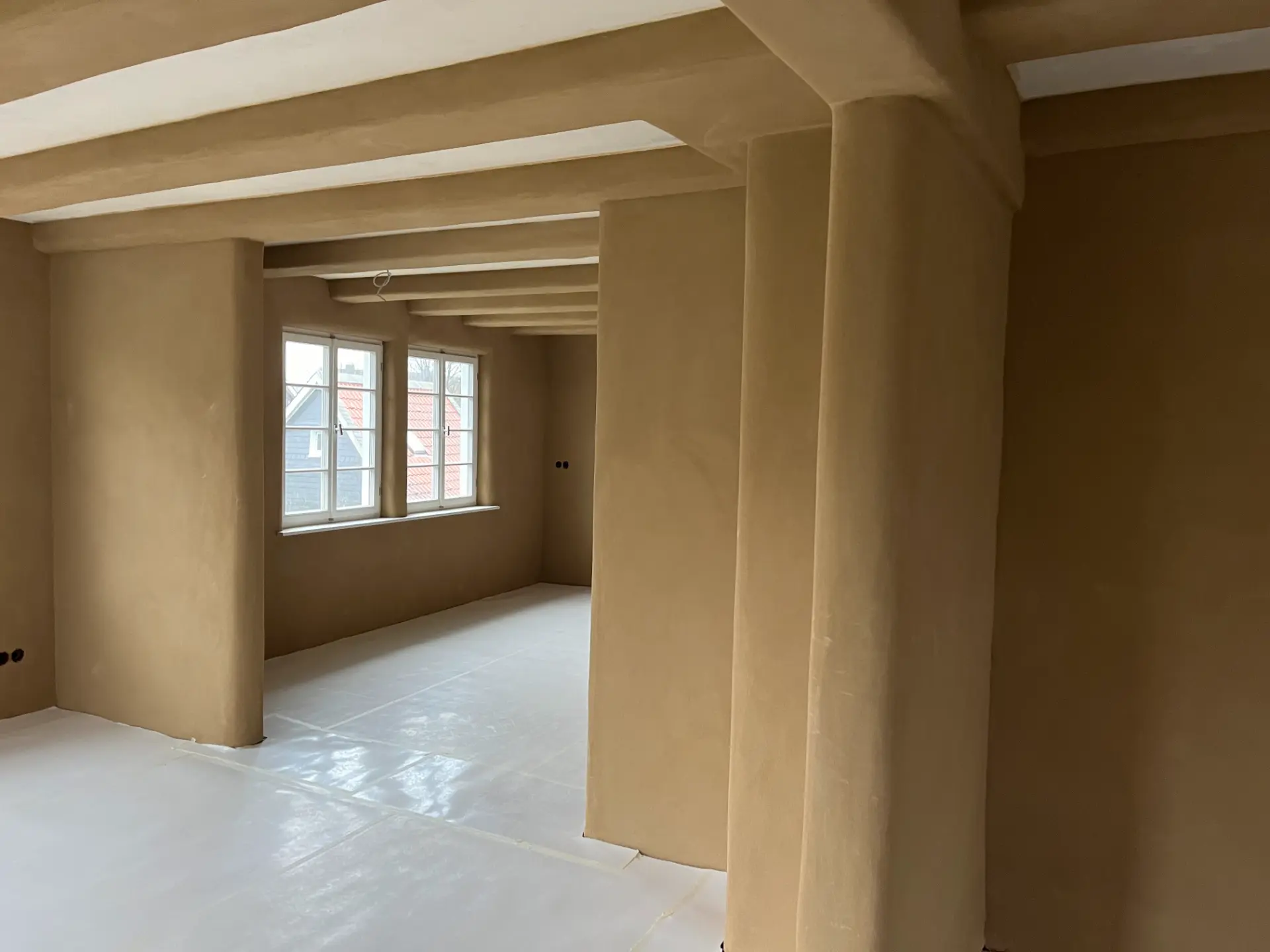 Präzise Lehmbauarbeiten am Munsterplatz in Remscheid Lennep durch Stuckateurmeister Alexander Leubner